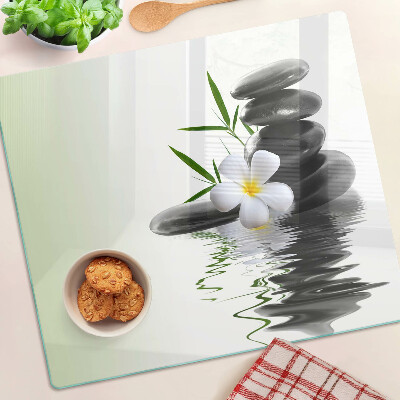 Glazen snijplanken Bloemen en stenen op het water