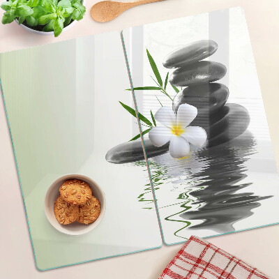 Glazen snijplanken Bloemen en stenen op het water