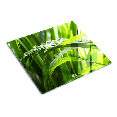 Snijplanken glas Waterdruppels op het gras
