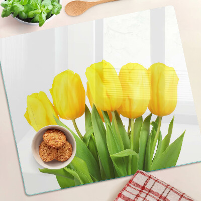 Snijplanken glas Gele tulpen op een groene achtergrond