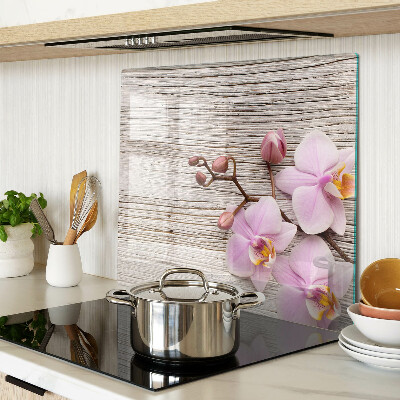 Glazen snijplanken Orchideeën op een houten achtergrond