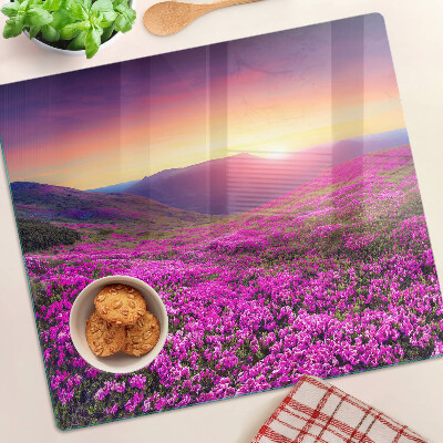 Snijplanken glas Bloemenlandschap bij zonsondergang