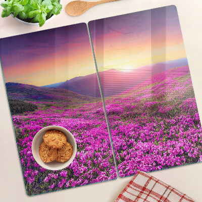 Snijplanken glas Bloemenlandschap bij zonsondergang