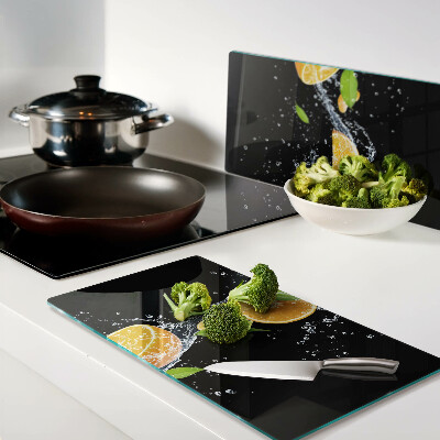 Snijplanken glas Citrusvruchten in water