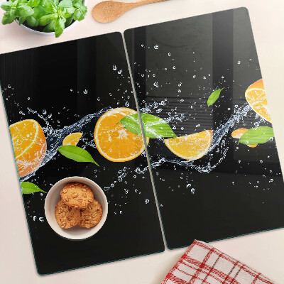Snijplanken glas Citrusvruchten in water