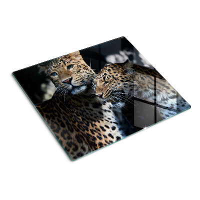 Snijplanken glas Cheeta's op een donkere achtergrond