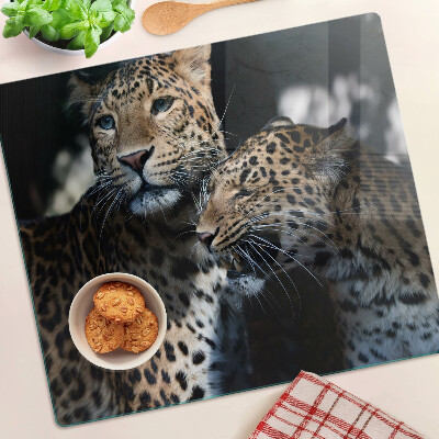 Snijplanken glas Cheeta's op een donkere achtergrond