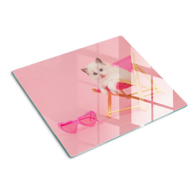 Glazen snijplanken Kitten op een ligstoel op een roze achtergrond