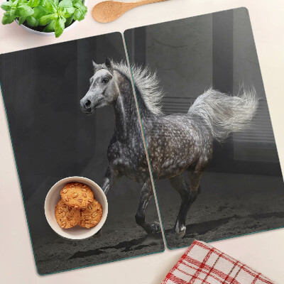 Snijplanken glas Een gevlekt paard op de vlucht