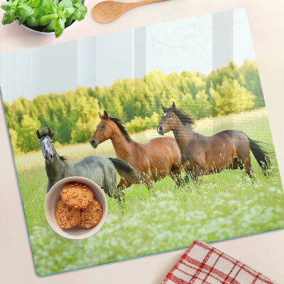Glazen snijplanken Een ontmoeting van paarden in het veld