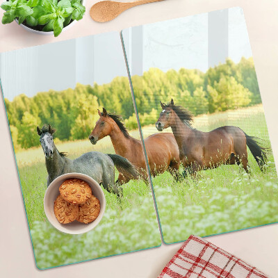 Glazen snijplanken Een ontmoeting van paarden in het veld