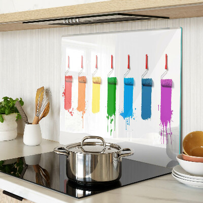 Snijplanken glas Een regenboog van verf in penselen