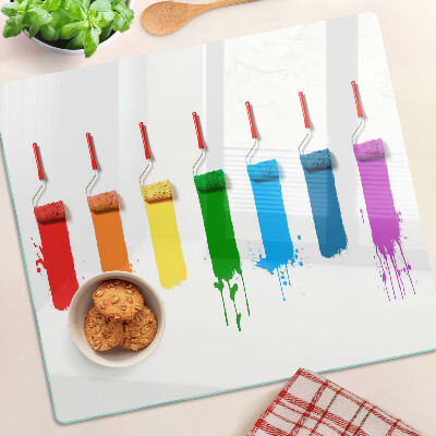 Snijplanken glas Een regenboog van verf in penselen