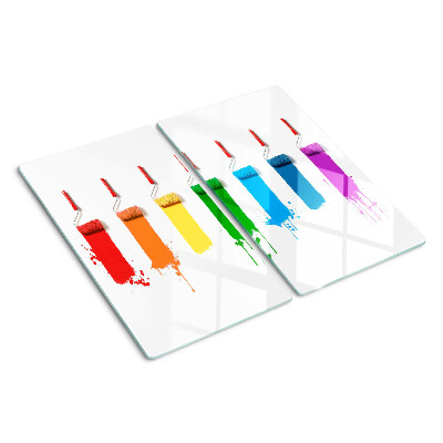 Snijplanken glas Een regenboog van verf in penselen
