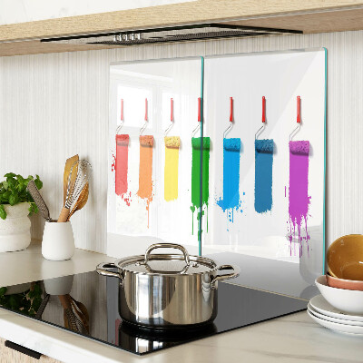 Snijplanken glas Een regenboog van verf in penselen