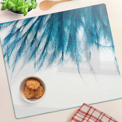 Snijplanken glas Blauwe veren op een witte achtergrond
