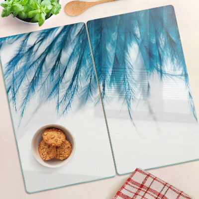 Snijplanken glas Blauwe veren op een witte achtergrond