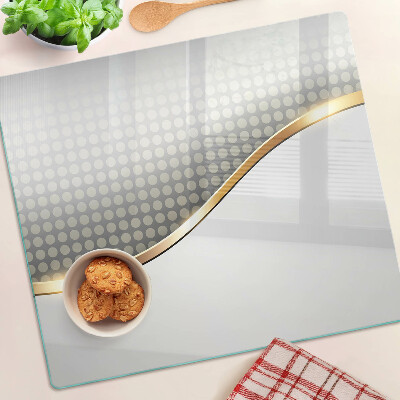 Snijplanken glas Gouden golf op een achtergrond van stippen