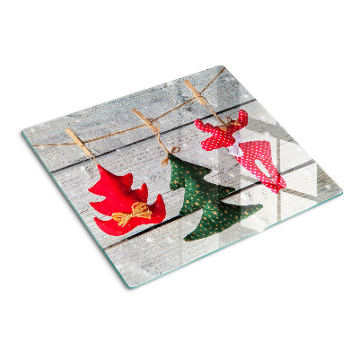 Glazen snijplanken Kerstversiering op een houten achtergrond