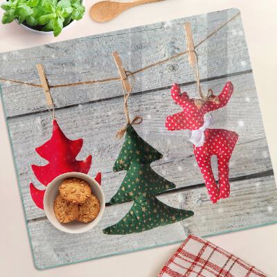 Glazen snijplanken Kerstversiering op een houten achtergrond