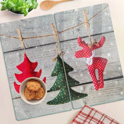 Glazen snijplanken Kerstversiering op een houten achtergrond