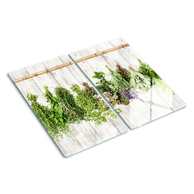 Glazen snijplanken Kruiden op een houten achtergrond