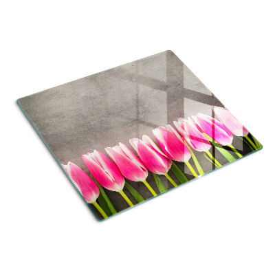 Glazen snijplanken Tulpen op een grijze achtergrond