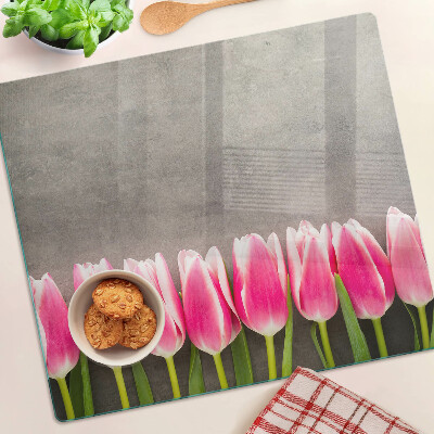 Glazen snijplanken Tulpen op een grijze achtergrond