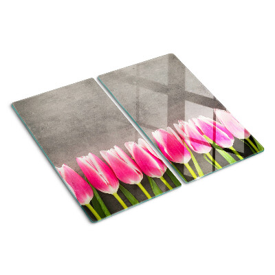 Glazen snijplanken Tulpen op een grijze achtergrond