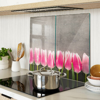 Glazen snijplanken Tulpen op een grijze achtergrond