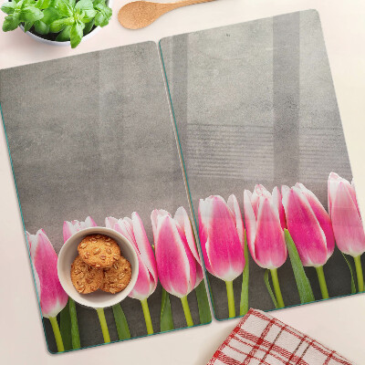 Glazen snijplanken Tulpen op een grijze achtergrond