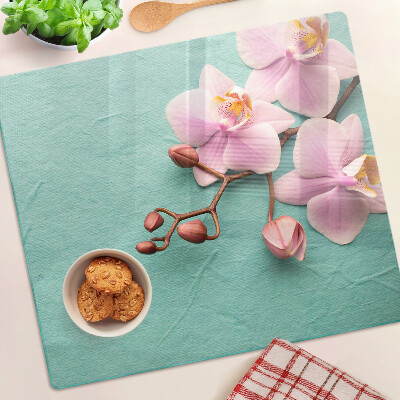 Snijplanken glas Orchideeën op een blauwe achtergrond