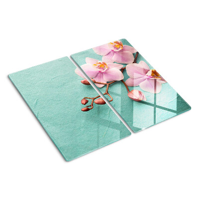Snijplanken glas Orchideeën op een blauwe achtergrond