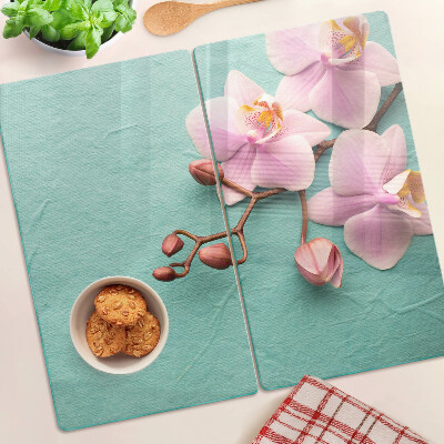 Snijplanken glas Orchideeën op een blauwe achtergrond
