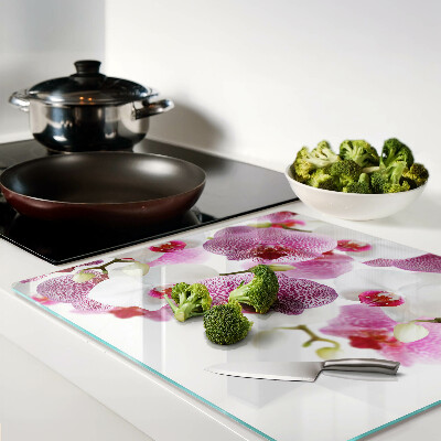 Glazen snijplanken Orchideeën voor het raam