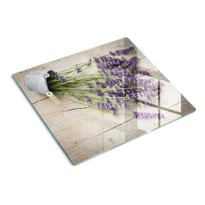 Glazen snijplanken Lavendel in een pot op een houten achtergrond