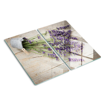 Glazen snijplanken Lavendel in een pot op een houten achtergrond