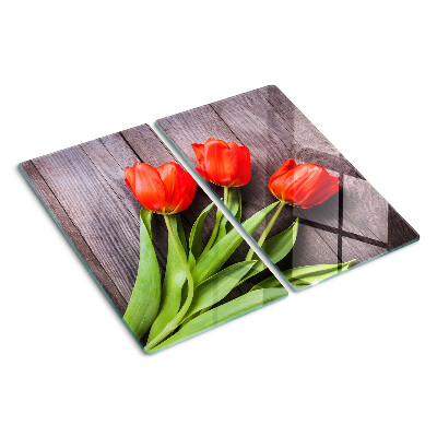 Glazen snijplanken Tulpen op een houten achtergrond