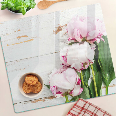 Snijplanken glas Pioenrozen op een houten achtergrond