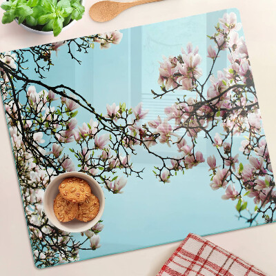 Snijplanken glas Magnoliabloemen op een blauwe achtergrond