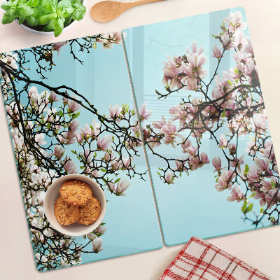 Snijplanken glas Magnoliabloemen op een blauwe achtergrond