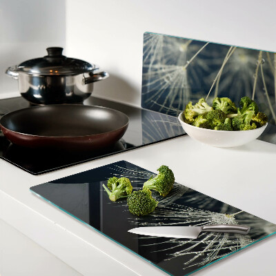 Snijplanken glas Paardenbloemen met waterdruppels