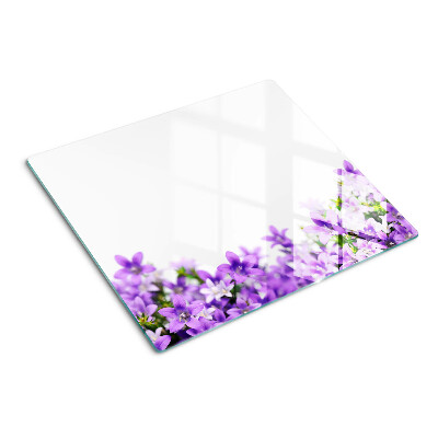 Snijplanken glas Paarse bloemen op de achtergrond
