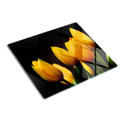 Snijplanken glas Gele tulpen op een zwarte achtergrond