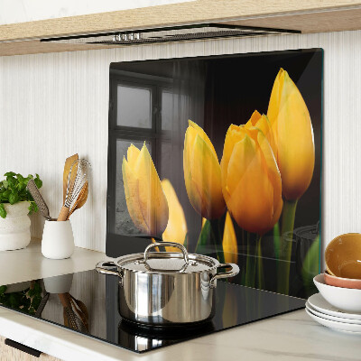 Snijplanken glas Gele tulpen op een zwarte achtergrond