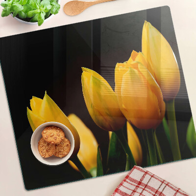 Snijplanken glas Gele tulpen op een zwarte achtergrond