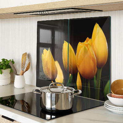 Snijplanken glas Gele tulpen op een zwarte achtergrond
