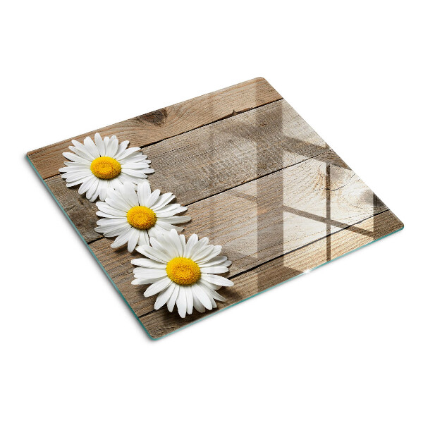 Glazen snijplanken Bloemen op een houten achtergrond