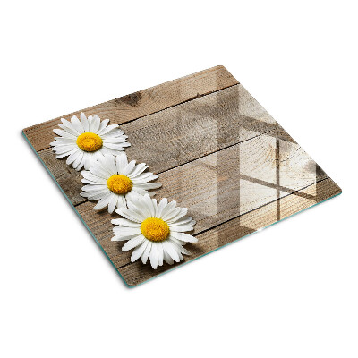 Glazen snijplanken Bloemen op een houten achtergrond