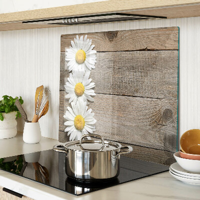 Glazen snijplanken Bloemen op een houten achtergrond